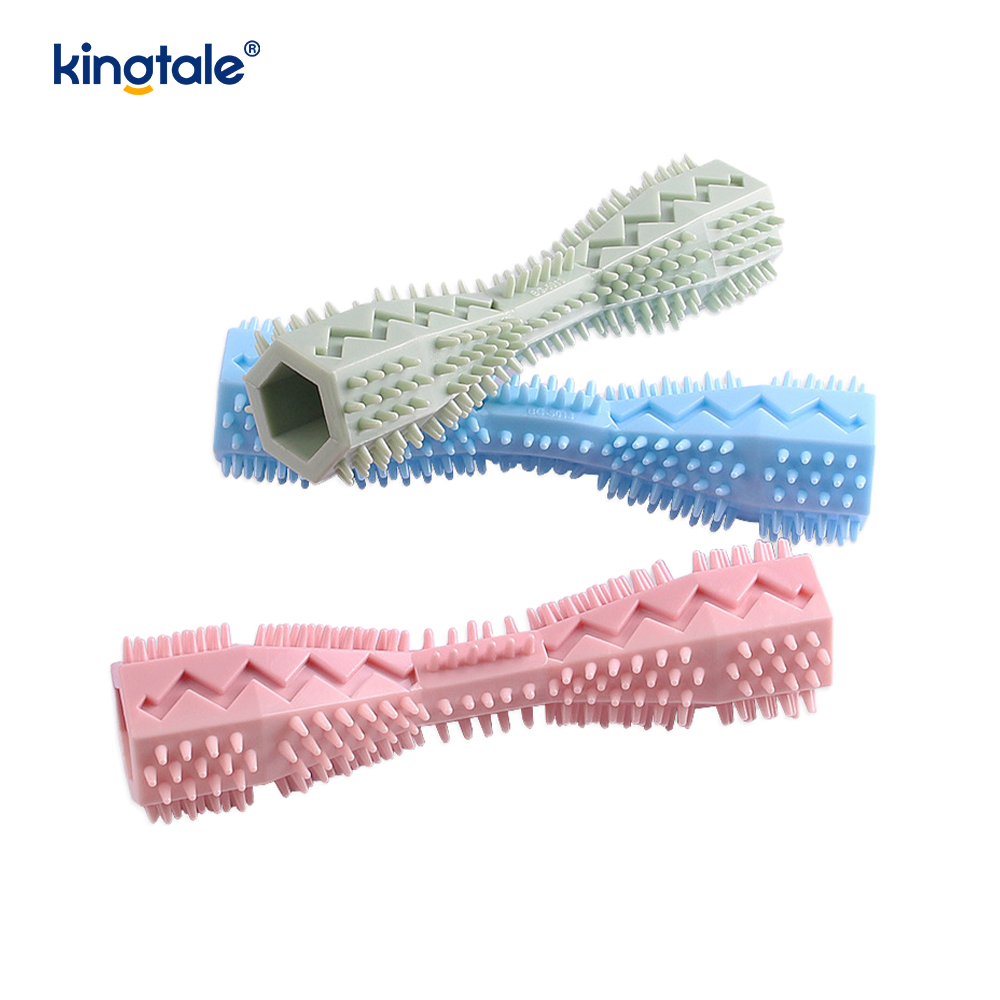 Dentição do animal de estimação e brinquedos sextavados dos cuidados dentários para limpar os dentes